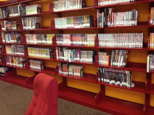 A manga collection at a public library. Notice the space on the shelves that allows for expansion.